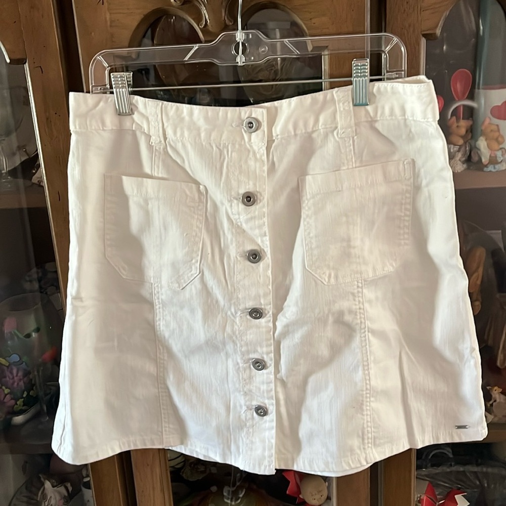 White cotton blend mid length skirt.